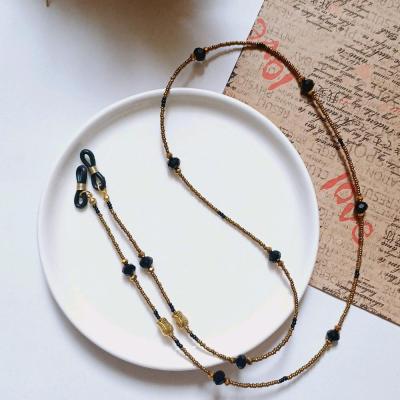 بند عینک منجوقی طلایی و گل لاله