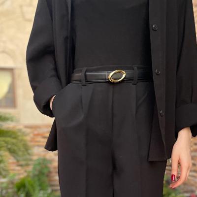 کمربند زنانه چرم بیضی سگک طلایی قهوه‌ای