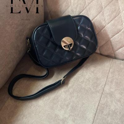 کیف زنانه چرم قفل دار دوخت لوزی