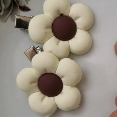 پک 2 عددی گیره مو انبری دخترانه طرح گل کرم
