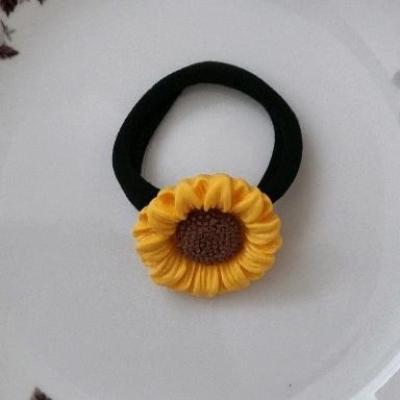 کش موی حوله‌ای طرح گل آفتابگردان