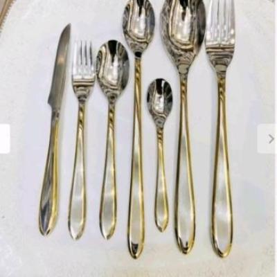 سرویس قاشق و چنگال 120 پارچه نیمه طلایی یونیک 4 میل