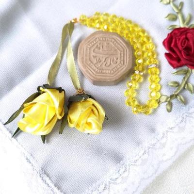 تسبیح فانتزی 33دانه زرد گلدار
