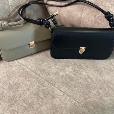 کیف زنانه چرم قفل دار دسته گره با متریال و چرم وارداتی