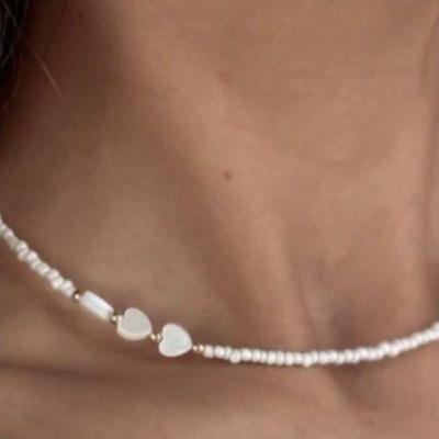 گردنبند قلب و منجوق.