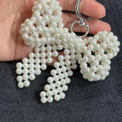 چارم بگ و آویز کلید پاپیون بزرگ مرواریدی