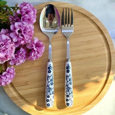 قاشق و چنگال دسته سرامیکی دنی هوم طرح گل آبی