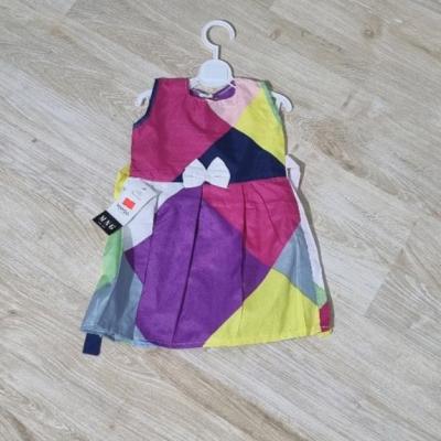 پیراهن دخترانه پارچه ای رنگارنگ مناسب برای استایل شاد و کودکانه