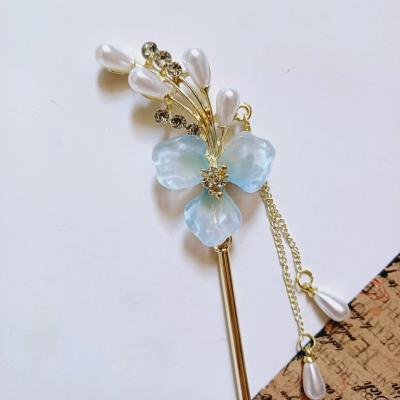 کانزاشی مو زنانه طرح گل سه پر آبکاری شده وارداتی