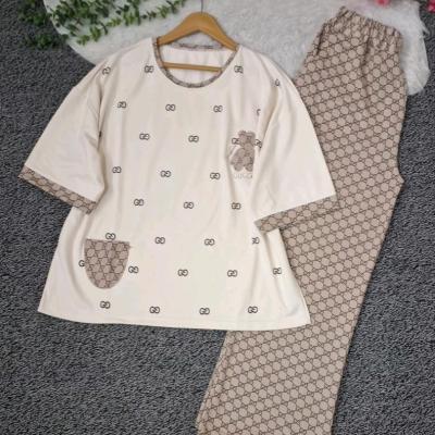 ست تیشرت و شلوار زنانه گوچی ، ارسال رایگان ، پنبه دورس اعلا گرم بالا ،