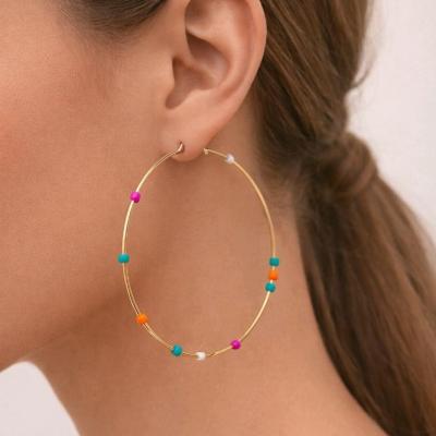 گوشواره حلقه ای طلایی با مرواریدهای رنگی برند I am